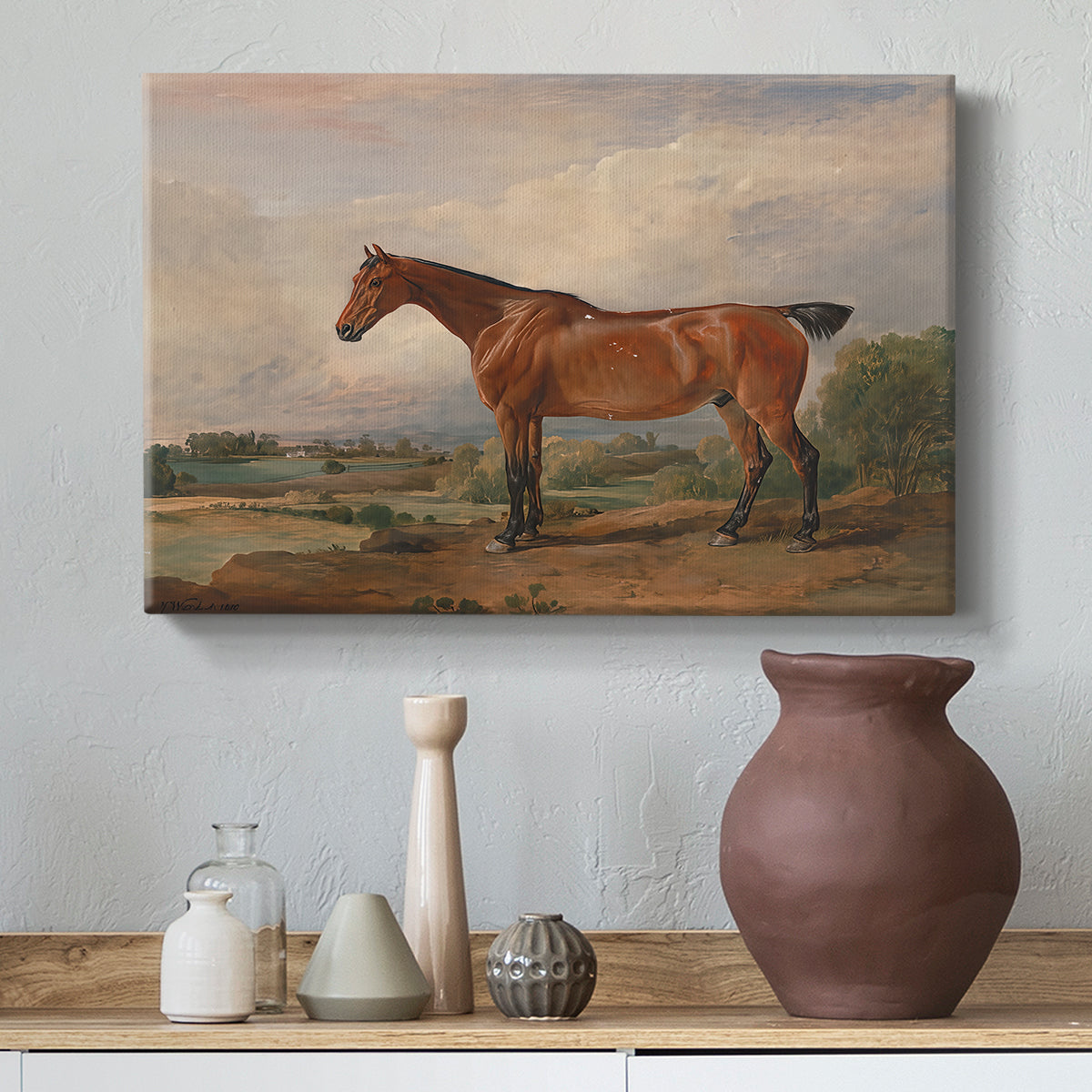 Canvas art print featuring a realistic depiction of hunter in natural terrain, styled above a decorative console