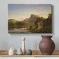 Canvas art print featuring a landscape combining architecture, figures, and open terrain, styled above a decorative console