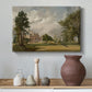 Canvas art print featuring a pastoral composition with building, styled above a decorative console