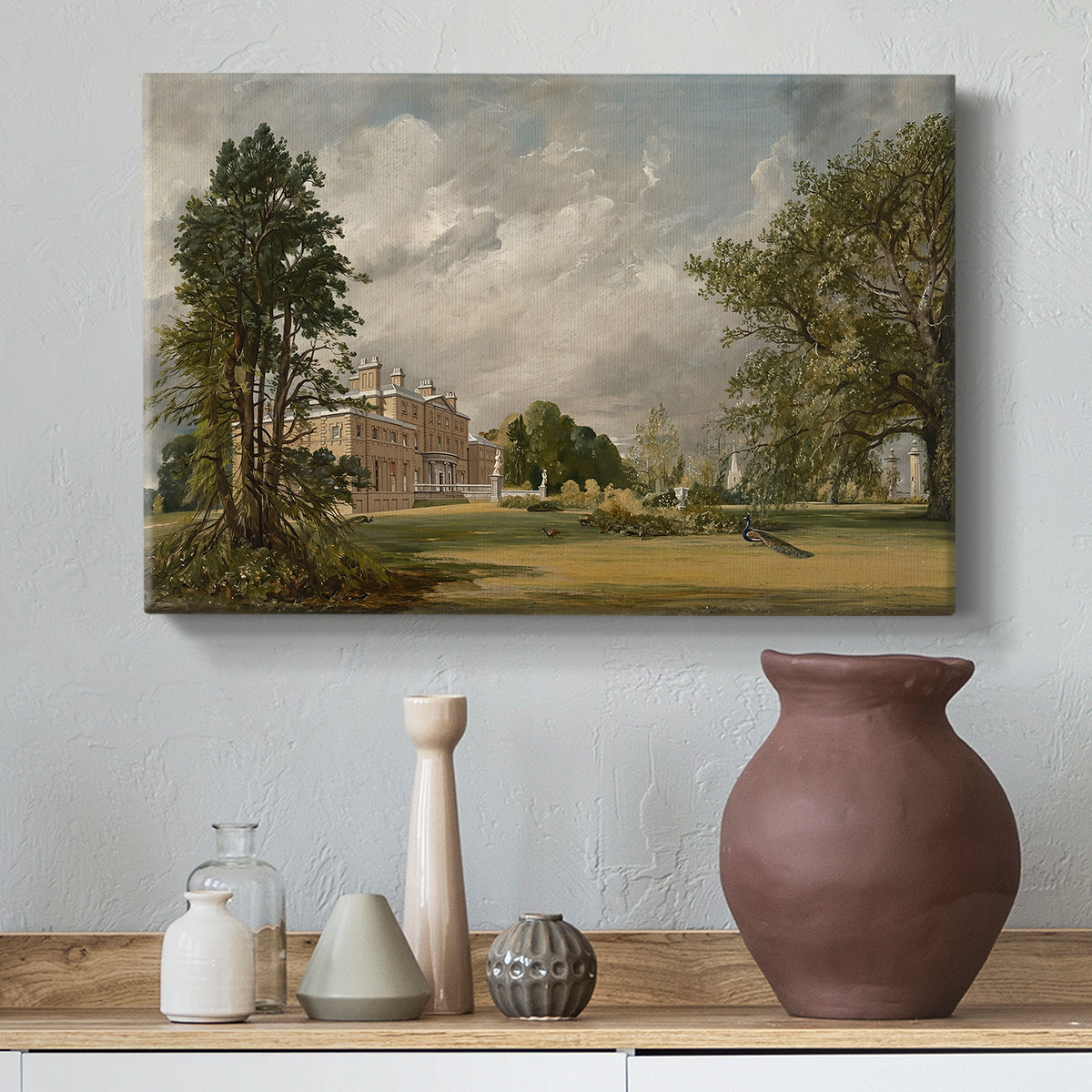 Canvas art print featuring a pastoral composition with building, styled above a decorative console