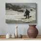 Canvas art print featuring a figures moving through open snowy terrain under gray sky, styled above a decorative console