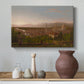 Canvas art print featuring a romantic cityscape integrated into natural terrain, styled above a decorative console