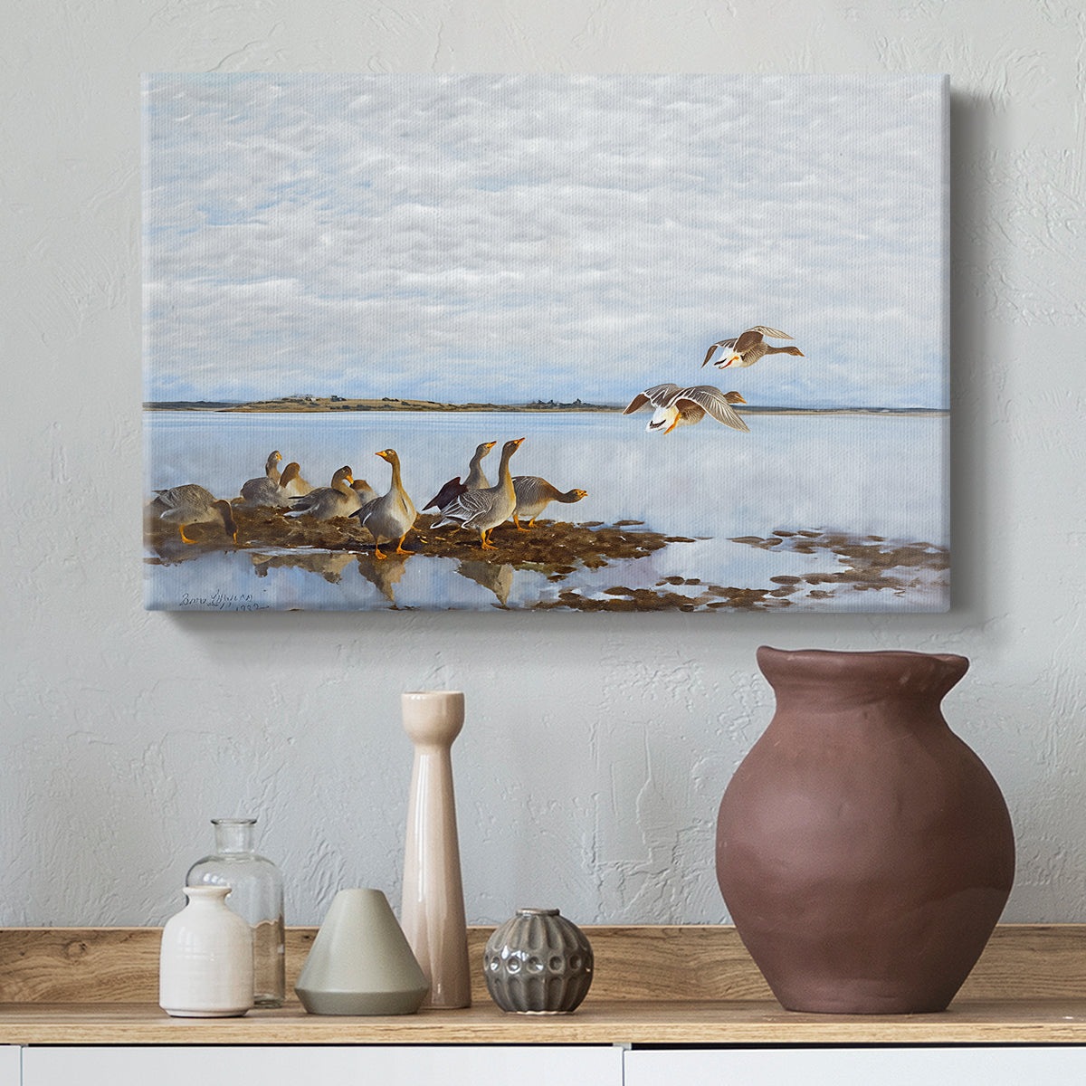 Canvas art print featuring a realistic wildlife scene of geese in calm outdoor environment, styled above a decorative console