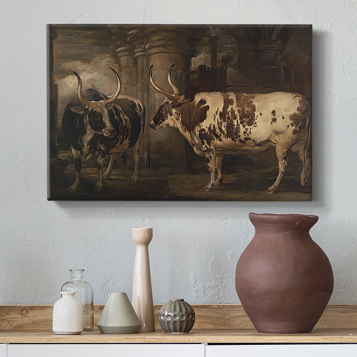 Canvas art print featuring a realistic depiction of cattle in countryside setting, styled above a decorative console