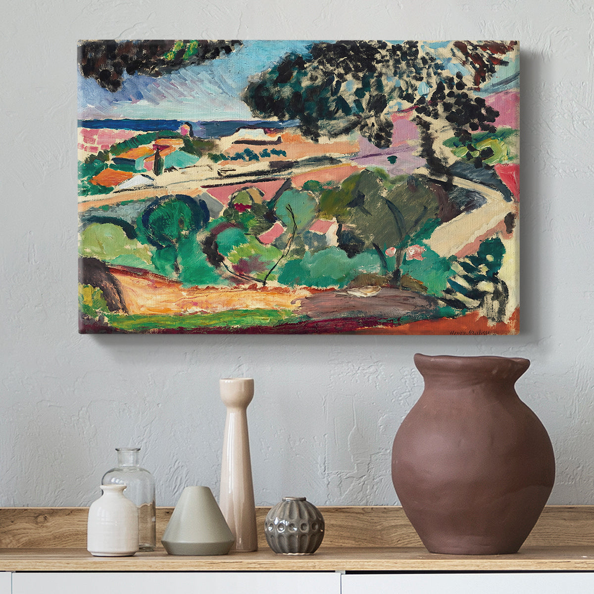 Canvas art print featuring an expressive landscape of colorful terrain and vegetation, styled above a decorative console
