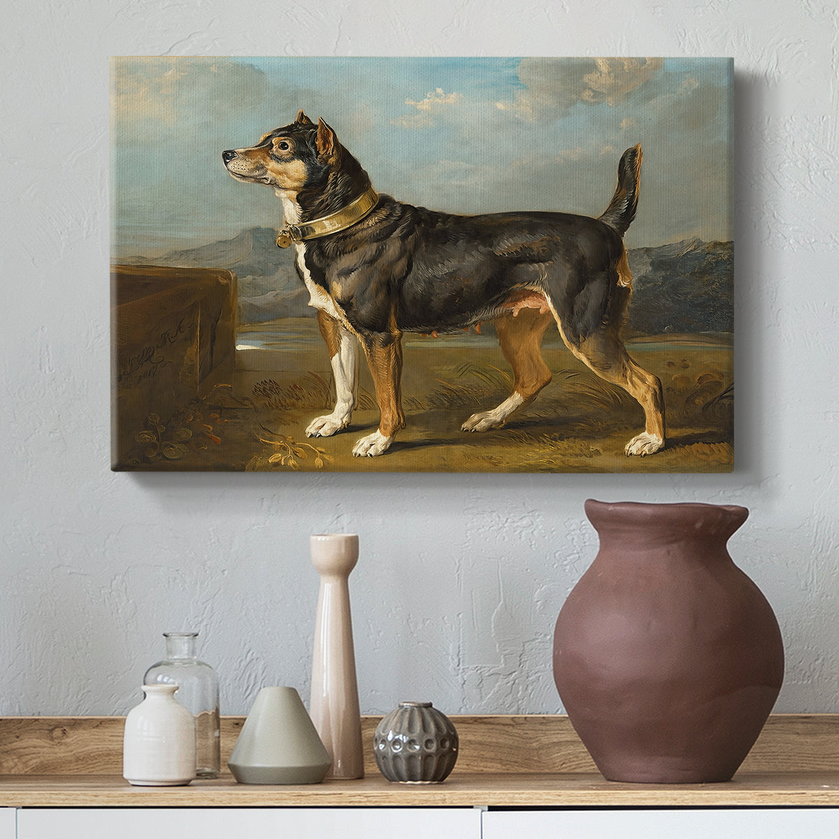 Canvas art print featuring an animal study of terrier in rural environment, styled above a decorative console