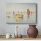 Canvas art print featuring a pointillist harbor at dawn, styled above a decorative console
