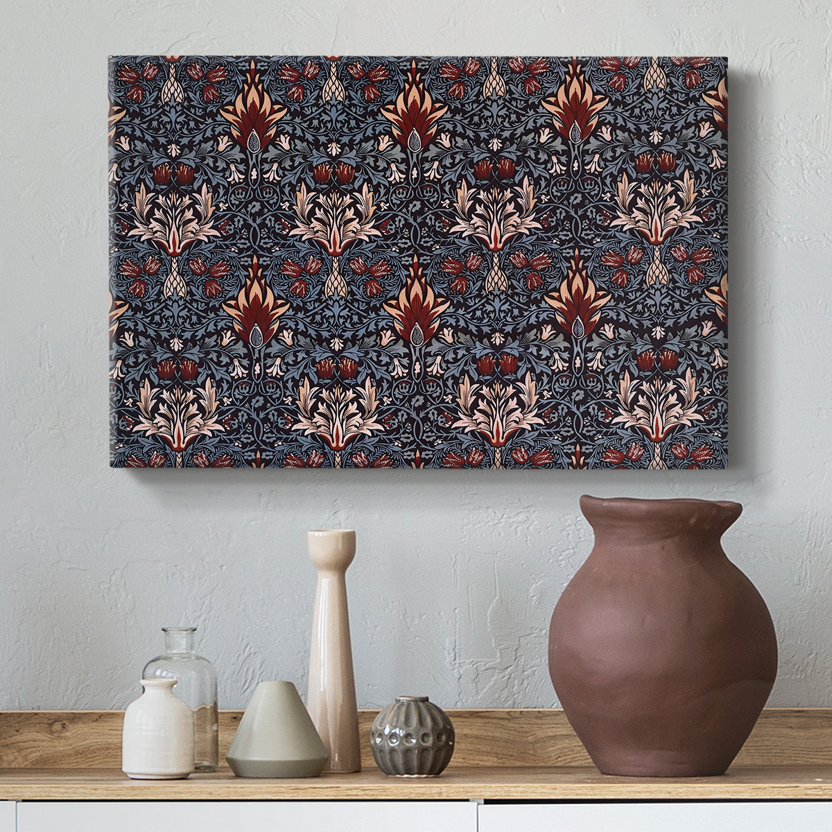 Canvas art print featuring a textile pattern with alternating blossoms and leaves, styled above a decorative console