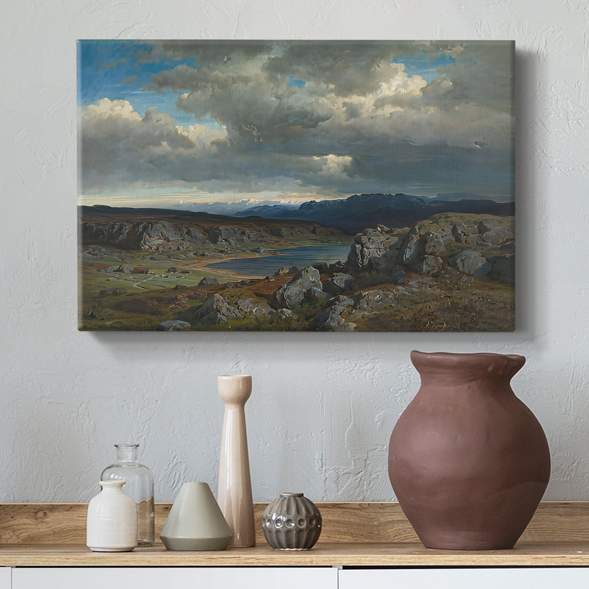 Canvas art print featuring a Nordic highland environment with minimal vegetation, styled above a decorative console