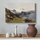 Canvas art print featuring an alpine vista with towering peak and foreground terrain, styled above a decorative console