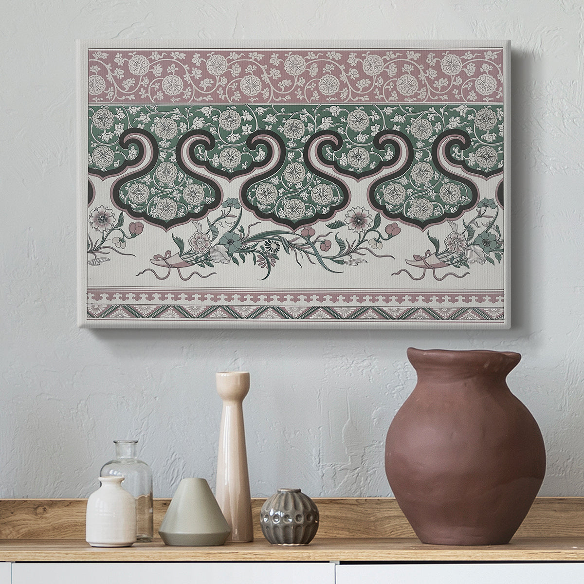 Canvas art print featuring a patterned composition featuring symmetrical abstract elements, styled above a decorative console