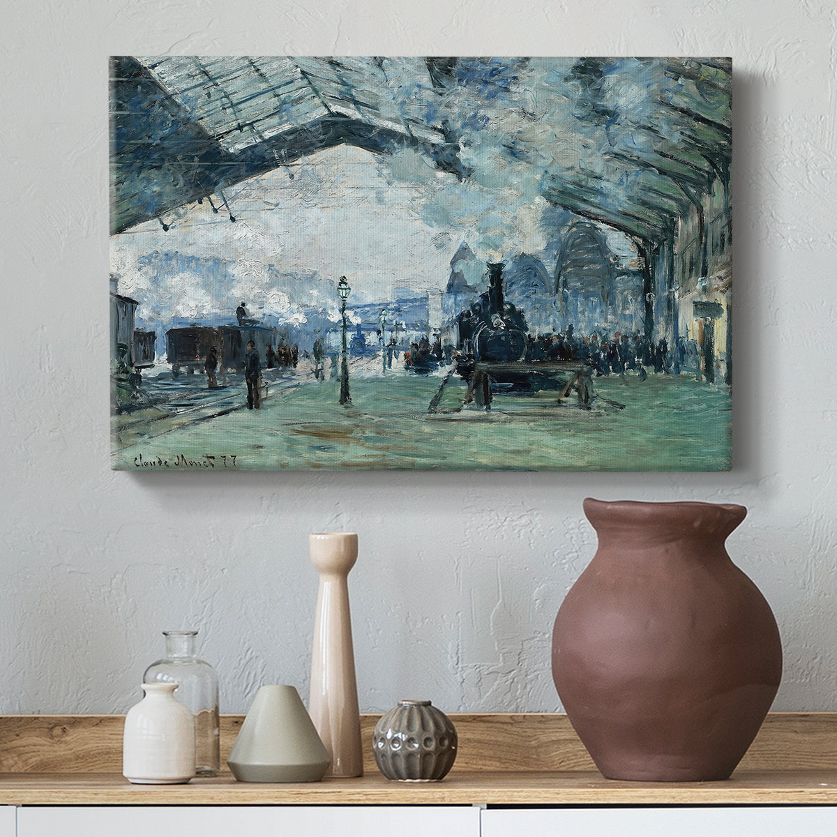 Canvas art print featuring an interior view of station filled with movement and smoke, styled above a decorative console