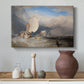 Canvas art print featuring a maritime scene with boats and people gathered along shoreline, styled above a decorative console