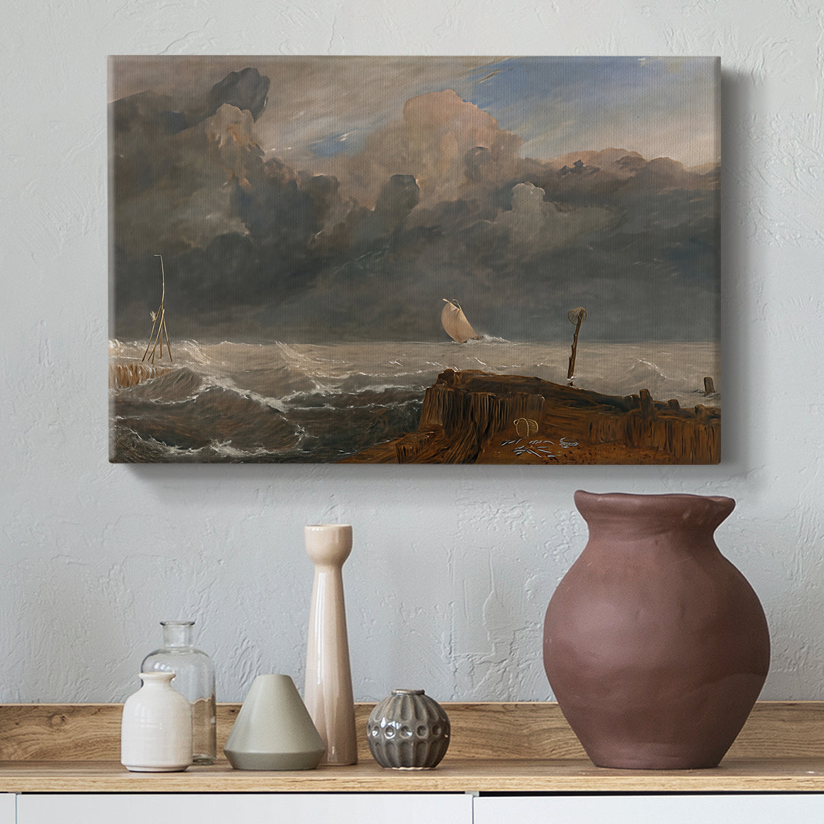 Canvas art print featuring an atmospheric coastal view, styled above a decorative console