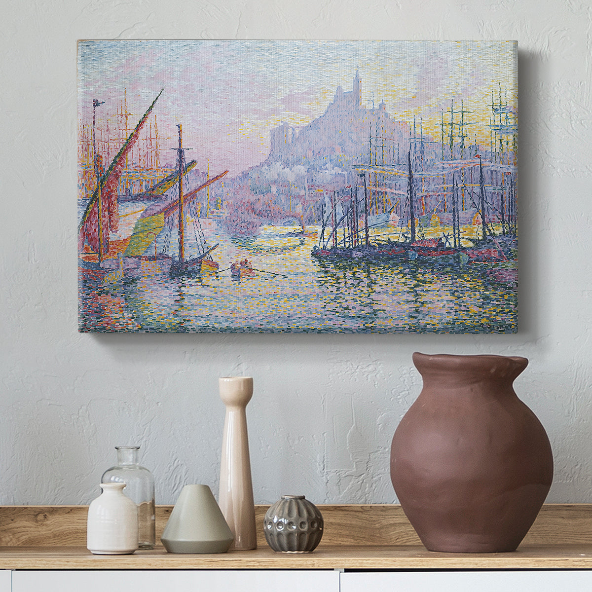 Canvas art print featuring a pointillist port activity, styled above a decorative console
