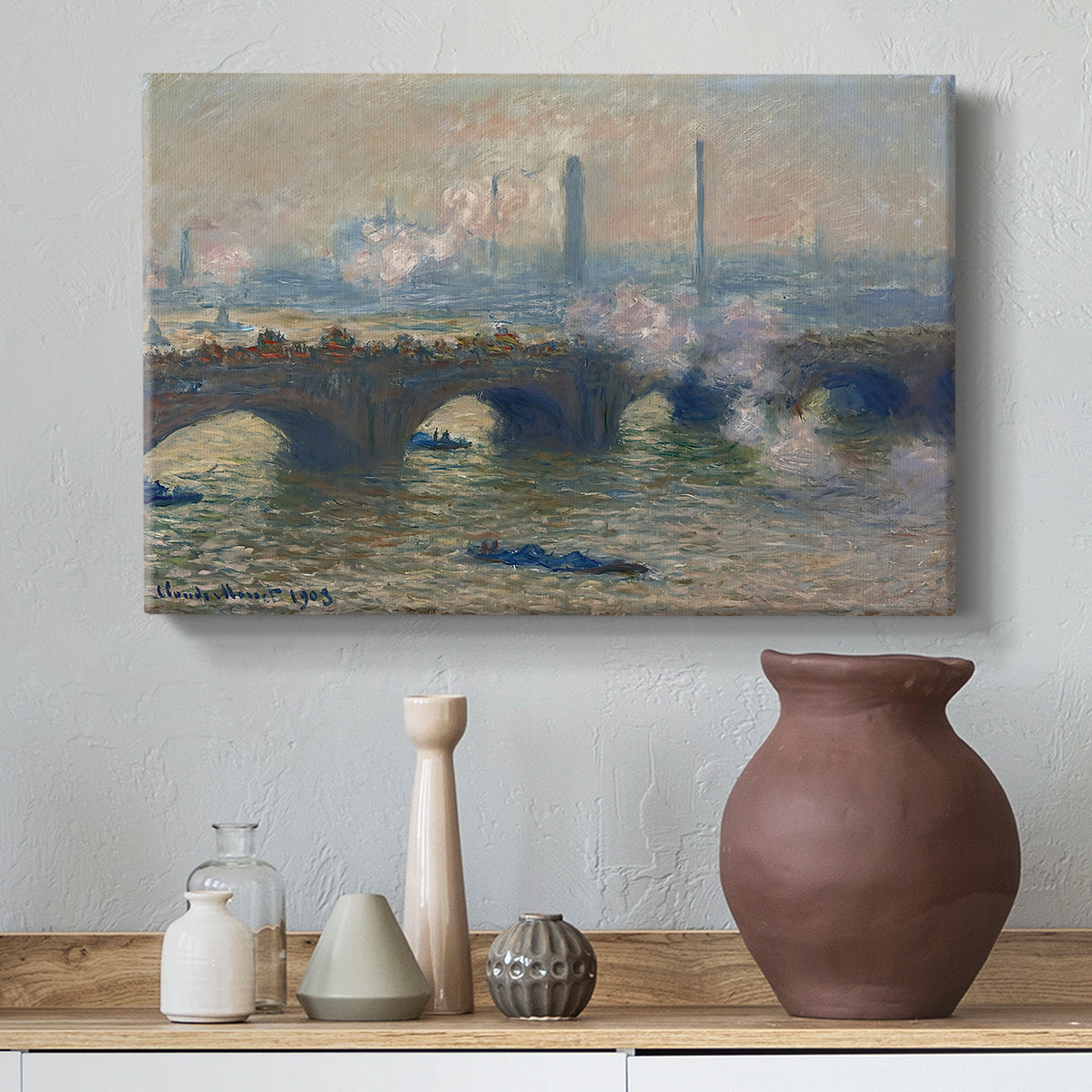 Canvas art print featuring a river and bridge scene with diffused light and urban backdrop, styled above a decorative console