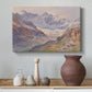 Canvas art print featuring a realistic depiction of high-altitude snowy peaks, styled above a decorative console