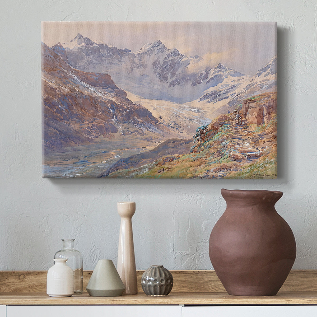 Canvas art print featuring a realistic depiction of high-altitude snowy peaks, styled above a decorative console