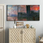 Three-panel canvas wall art featuring parliament silhouetted at dusk, displayed above a cabinet in an entryway.