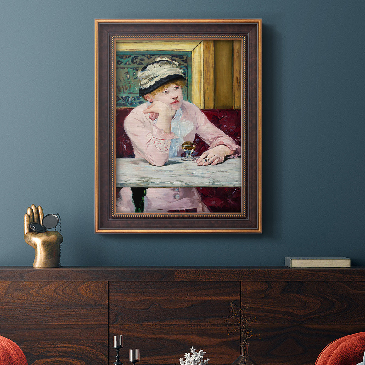 Impressionist portrait scene with plum brandy by Édouard Manet in an ornate bronzed mahogany wood frame displayed in a dark-toned interior setting.