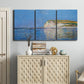 Three-panel canvas wall art featuring white cliffs rising above sea, displayed above a cabinet in an entryway.