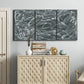 Three-panel canvas wall art featuring abstract view through window forms, displayed above a cabinet in an entryway.