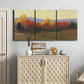 Three-panel canvas wall art featuring autumn landscape changing foliage, displayed above a cabinet in an entryway.