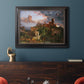Romantic allegorical landscape painting by Jasper Francis Cropsey in an ornate black frame with gilded inner detail displayed in a dark-toned interior setting.