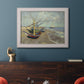 Impressionist coastal fishing boats scene by Vincent van Gogh in an ornate weathered white frame displayed in a dark-toned interior setting.
