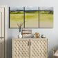 Three-panel canvas wall art featuring abstract terrace landscape view, displayed above a cabinet in an entryway.