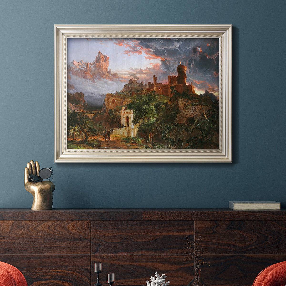 Romantic allegorical landscape painting by Jasper Francis Cropsey in an ornate champagne frame displayed in a dark-toned interior setting.