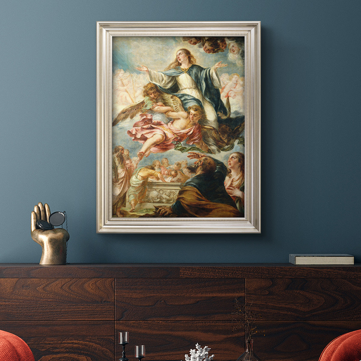 Religious painting of the Assumption of the Virgin Mary by Juan de Valdés Leal in an ornate champagne frame displayed in a dark-toned interior setting.