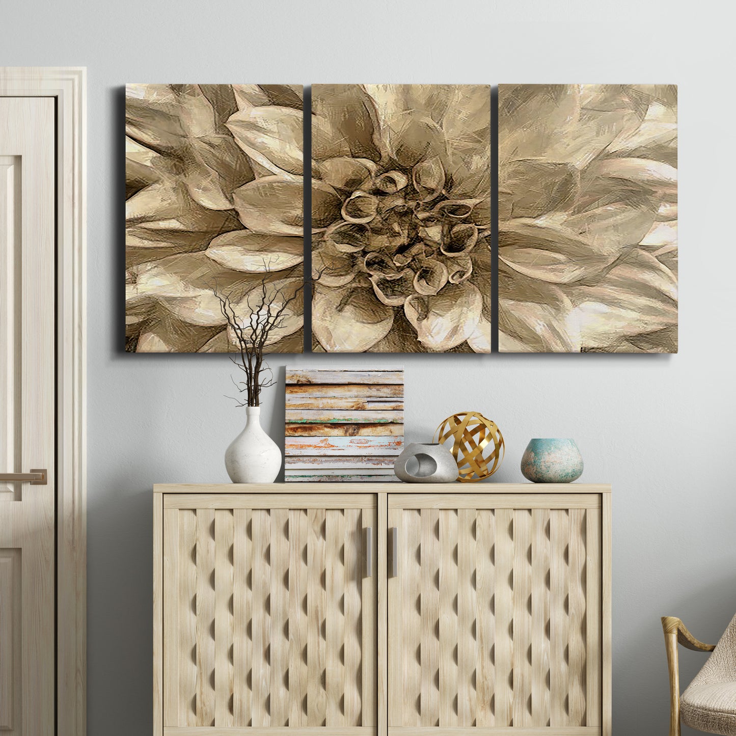 Three-panel canvas wall art featuring monochrome floral linework composition, displayed above a cabinet in an entryway.