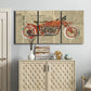 Three-panel canvas wall art featuring vintage red vehicle collage detail, displayed above a cabinet in an entryway.