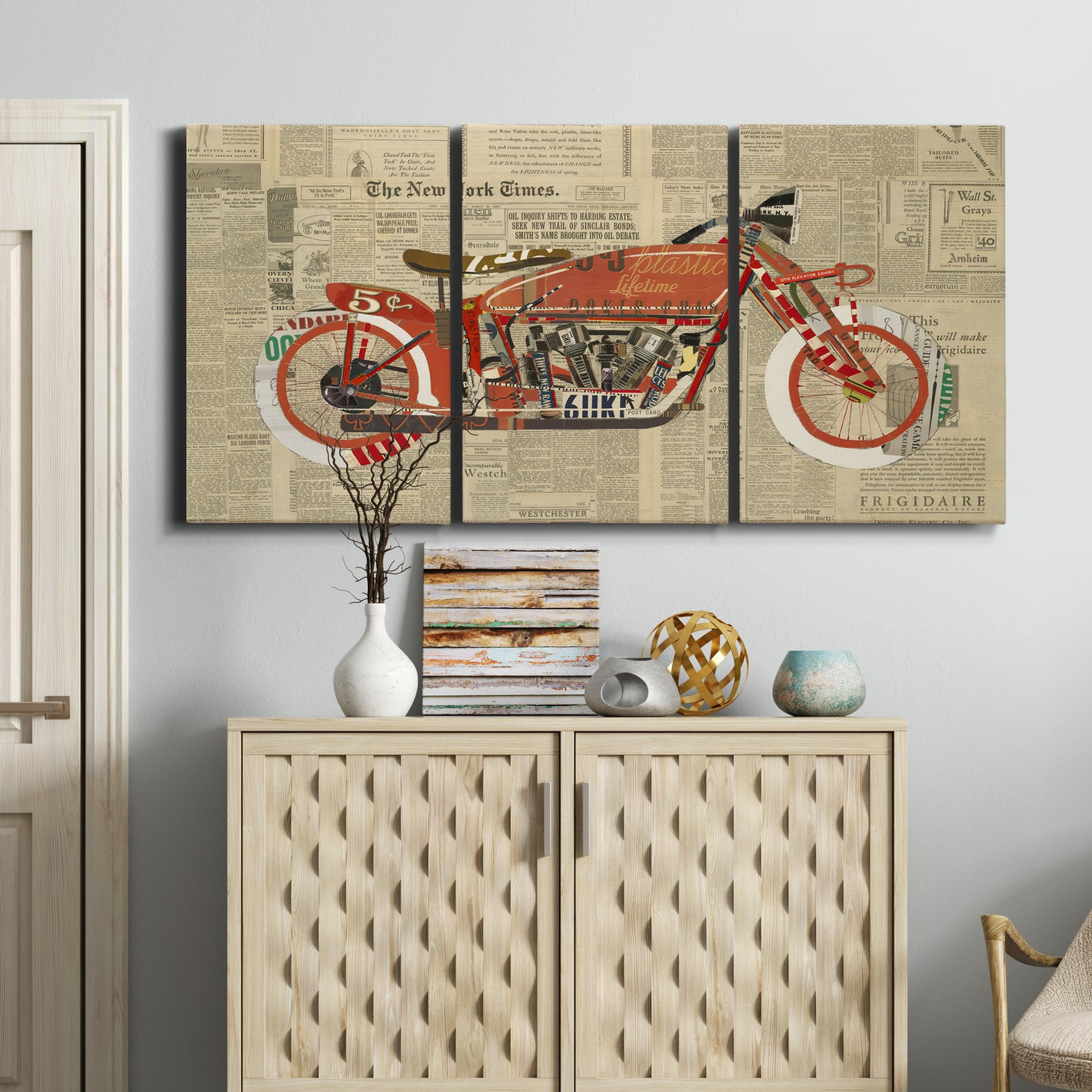 Three-panel canvas wall art featuring vintage red vehicle collage detail, displayed above a cabinet in an entryway.