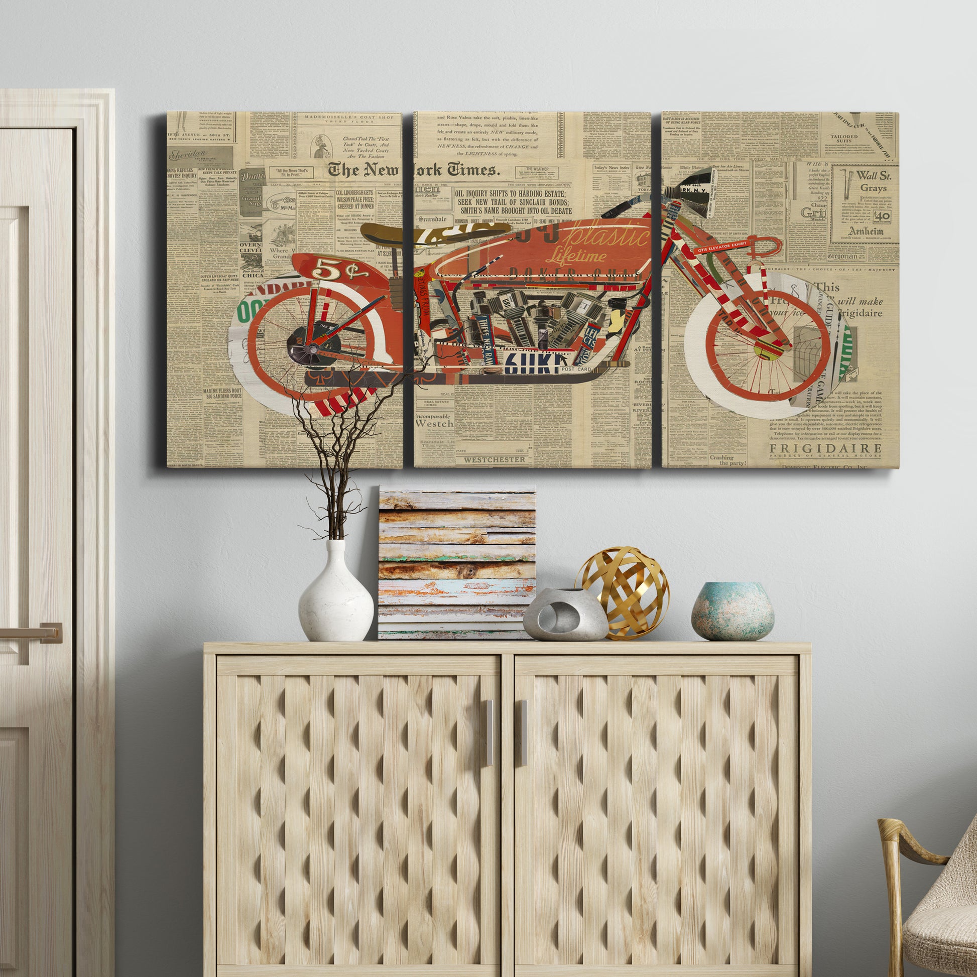 Three-panel canvas wall art featuring vintage red vehicle collage detail, displayed above a cabinet in an entryway.