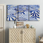 Three-panel canvas wall art featuring geometric abstract bowl forms, displayed above a cabinet in an entryway.