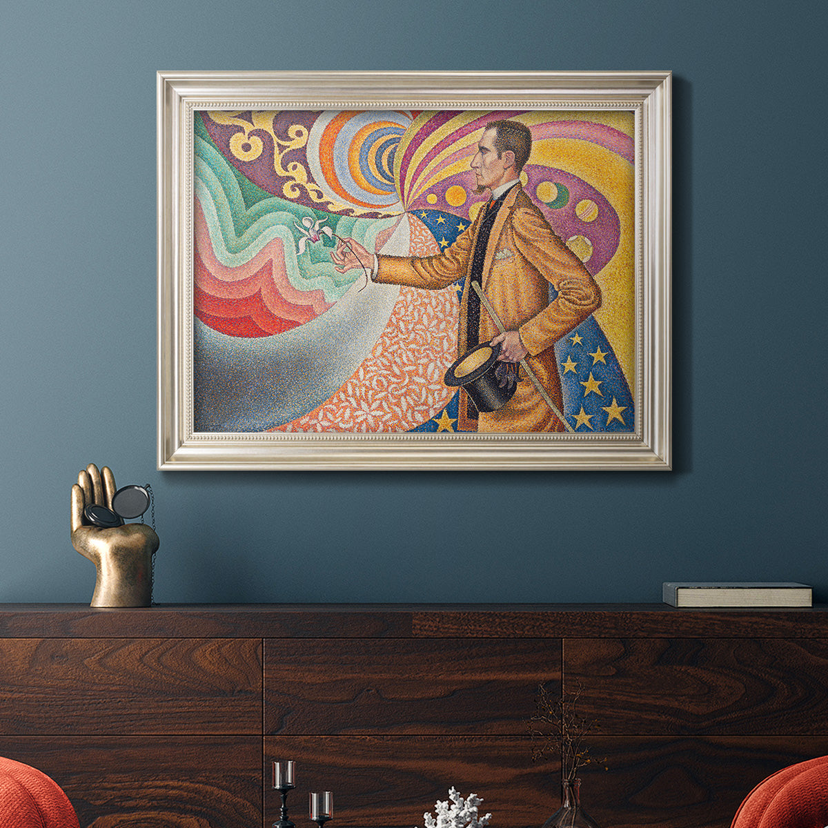 Neo-impressionist abstract portrait by Paul Signac in an ornate champagne frame displayed in a dark-toned interior setting.