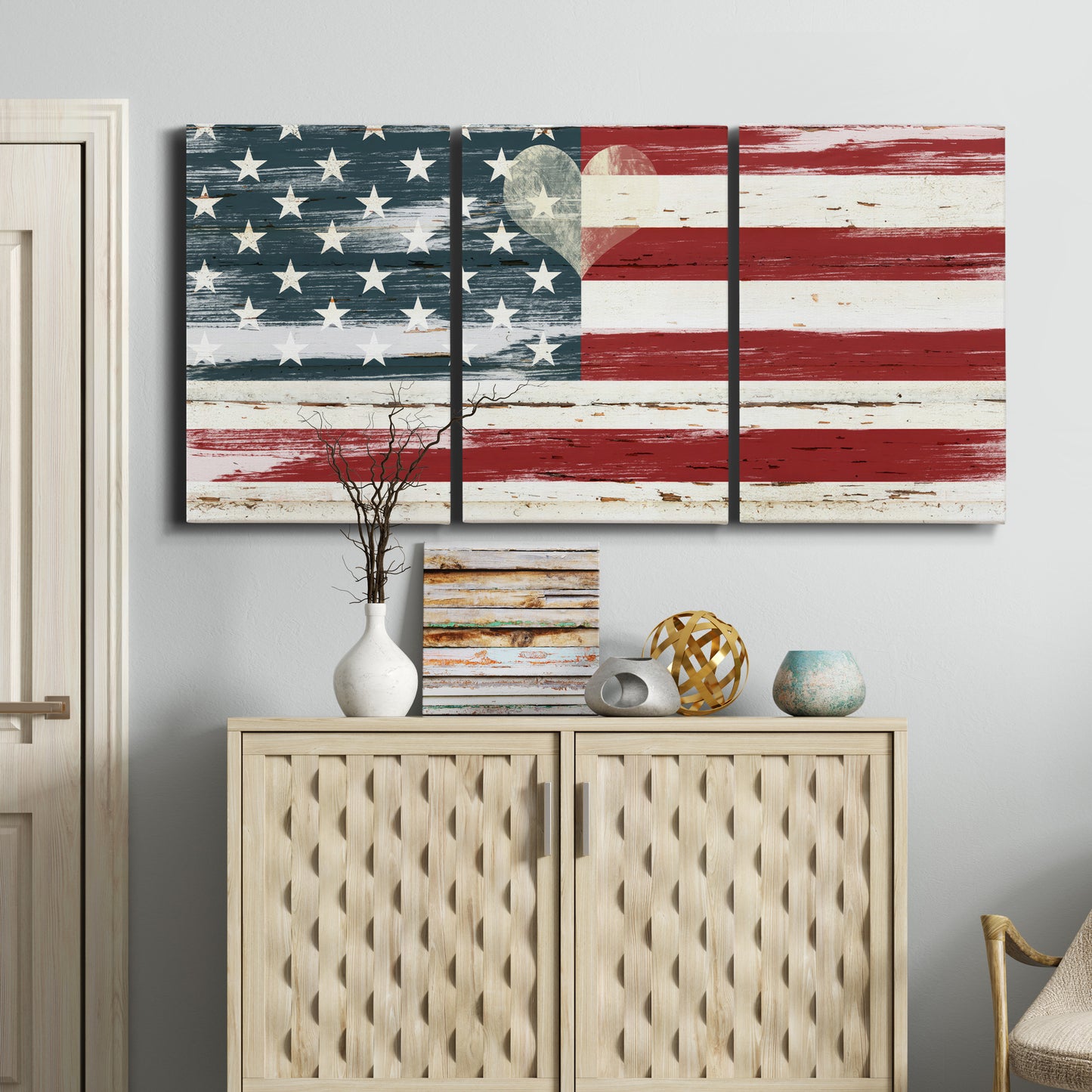 Three-panel canvas wall art featuring rustic american flag country style, displayed above a cabinet in an entryway.