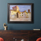 Impressionist Italian village scene by John Singer Sargent in an ornate black frame with gilded inner detail displayed in a dark-toned interior setting.