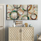 Three-panel canvas wall art featuring geometric circular abstract design, displayed above a cabinet in an entryway.