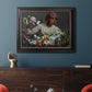 Traditional portrait of a woman holding peonies by Frédéric Bazille in an ornate black frame with gilded inner detail displayed in a dark-toned interior setting.