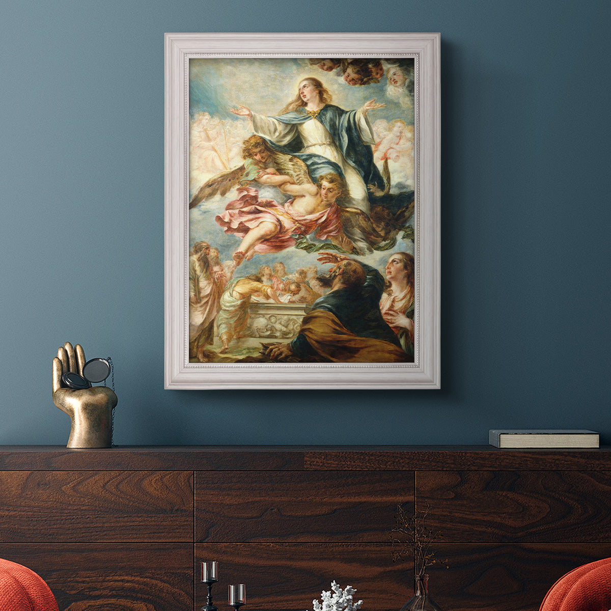 Religious painting of the Assumption of the Virgin Mary by Juan de Valdés Leal in an ornate weathered white frame displayed in a dark-toned interior setting.