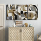 Three-panel canvas wall art featuring overlapping mid century geometric shapes, displayed above a cabinet in an entryway.