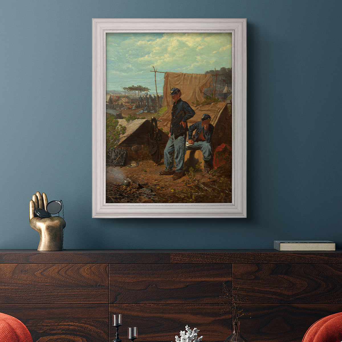 American genre scene of domestic life by Winslow Homer in an ornate weathered white frame displayed in a dark-toned interior setting.