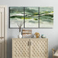 Three-panel canvas wall art featuring abstract passage of time composition, displayed above a cabinet in an entryway.