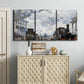 Three-panel canvas wall art featuring playful peach toned floral composition, displayed above a cabinet in an entryway.