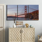 Three-panel canvas wall art featuring golden gate bridge spanning bay, displayed above a cabinet in an entryway.