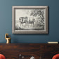 Classical countryside landscape artwork by Nicolas Berchem in an ornate vintage silver frame displayed in a dark-toned interior setting.
