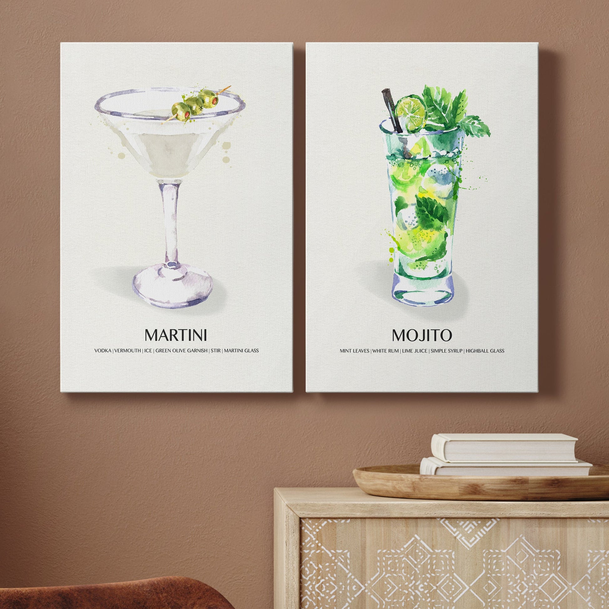 Matching vertical canvas prints of vintage martini cocktail illustration displayed against a darker accent wall.